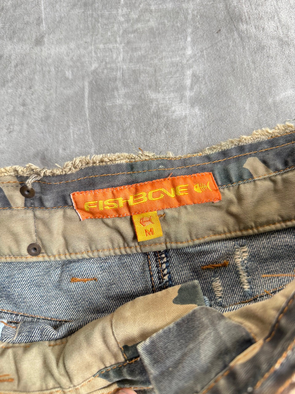 Fishbone Distressed Denim Mini Skirt