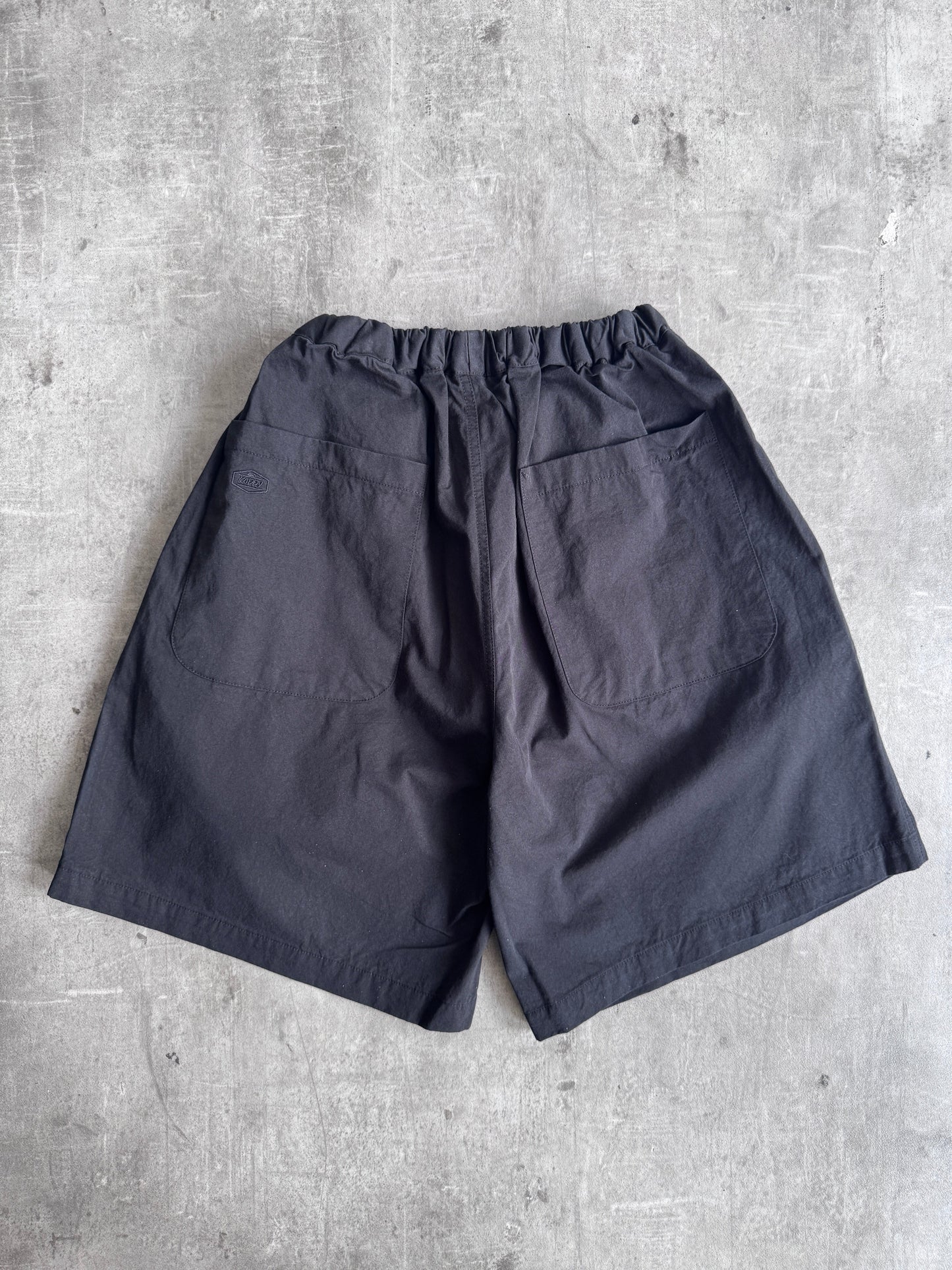 Kappy Korea Two Tuck Pleated Wide Half Pants - Black | ONE SIZE, Black