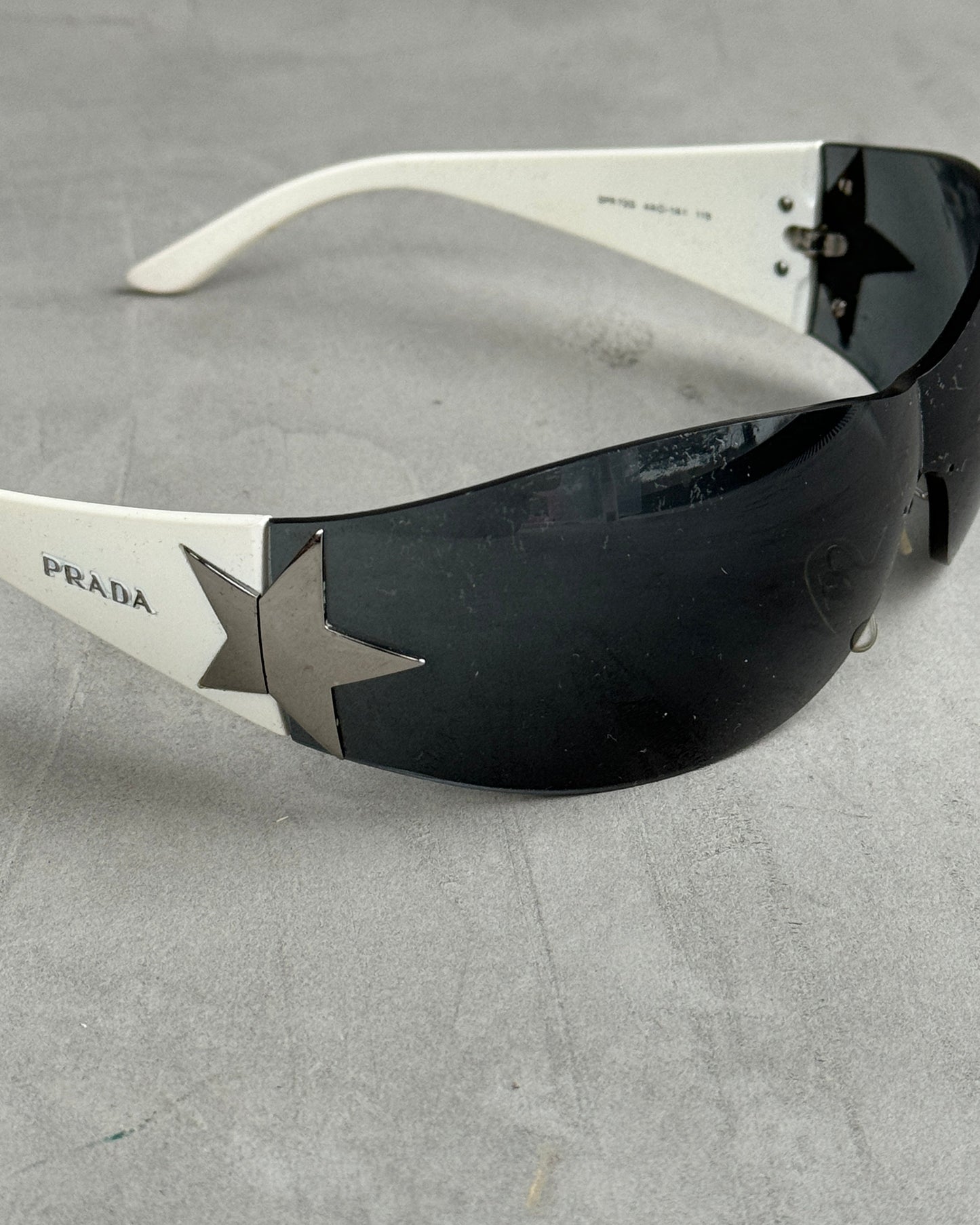 PRADA WRAP AROUND WHITE STAR SUNGLASSES | O/S, Silver