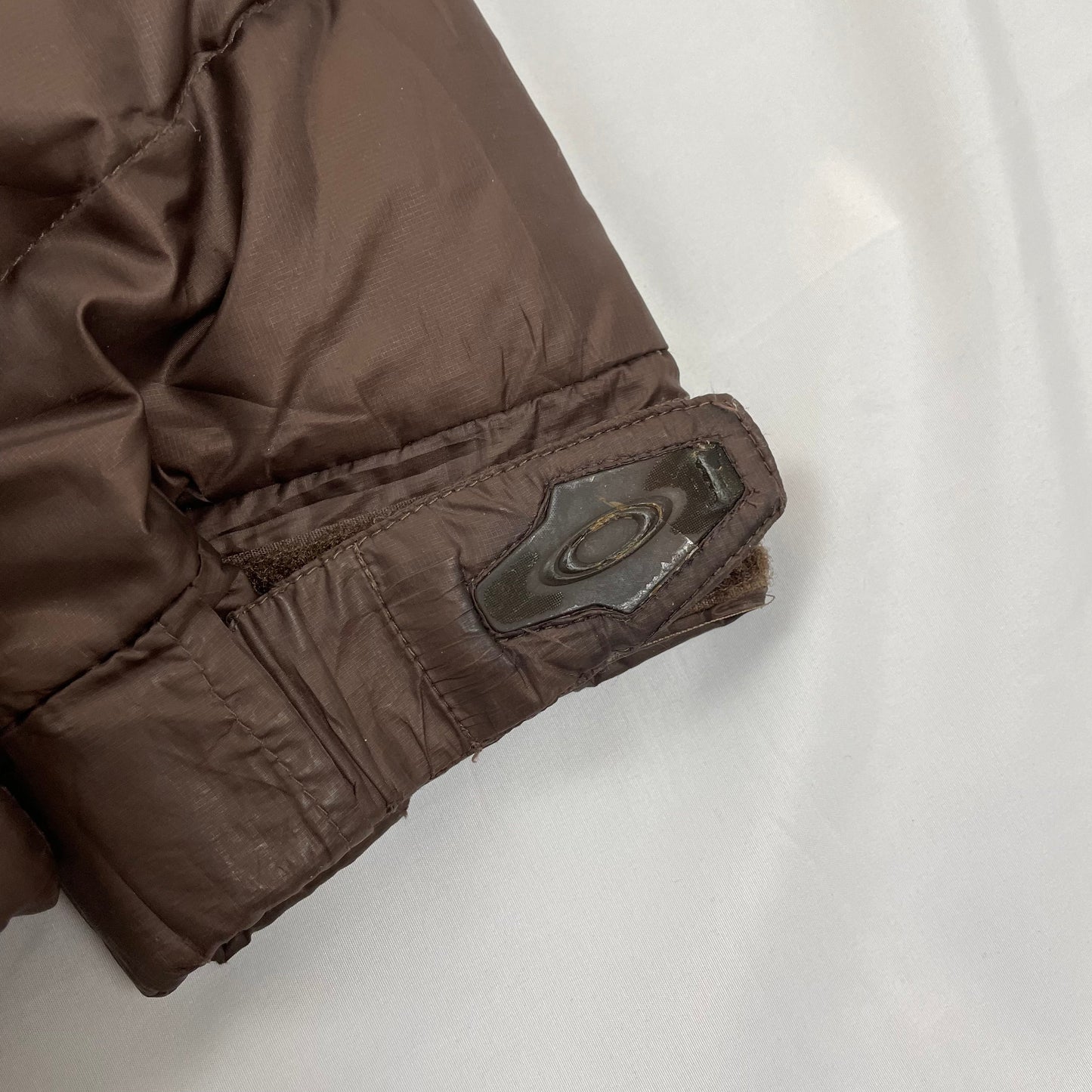 Vintage Oakley Asymmetrical Puffer Jacket, Size Medium | O/S, Brown