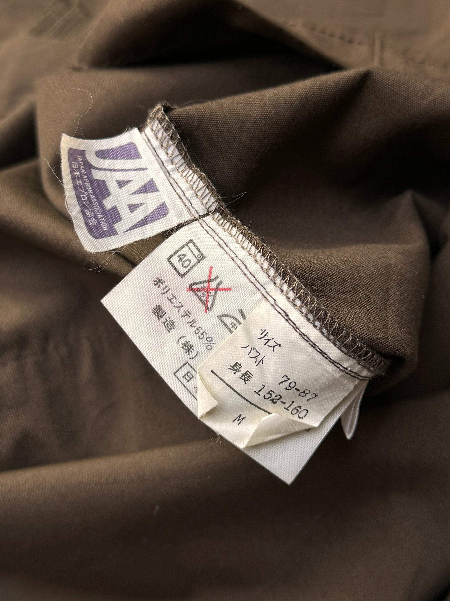 Issey Miyake Oversized Printed Logo Brown Mid-Length Jacket