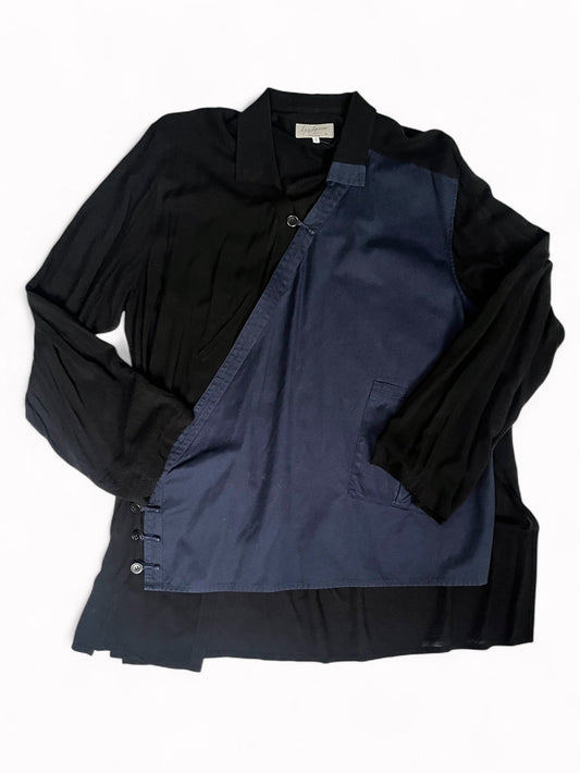 Black and navy two-tone shirt on a white background