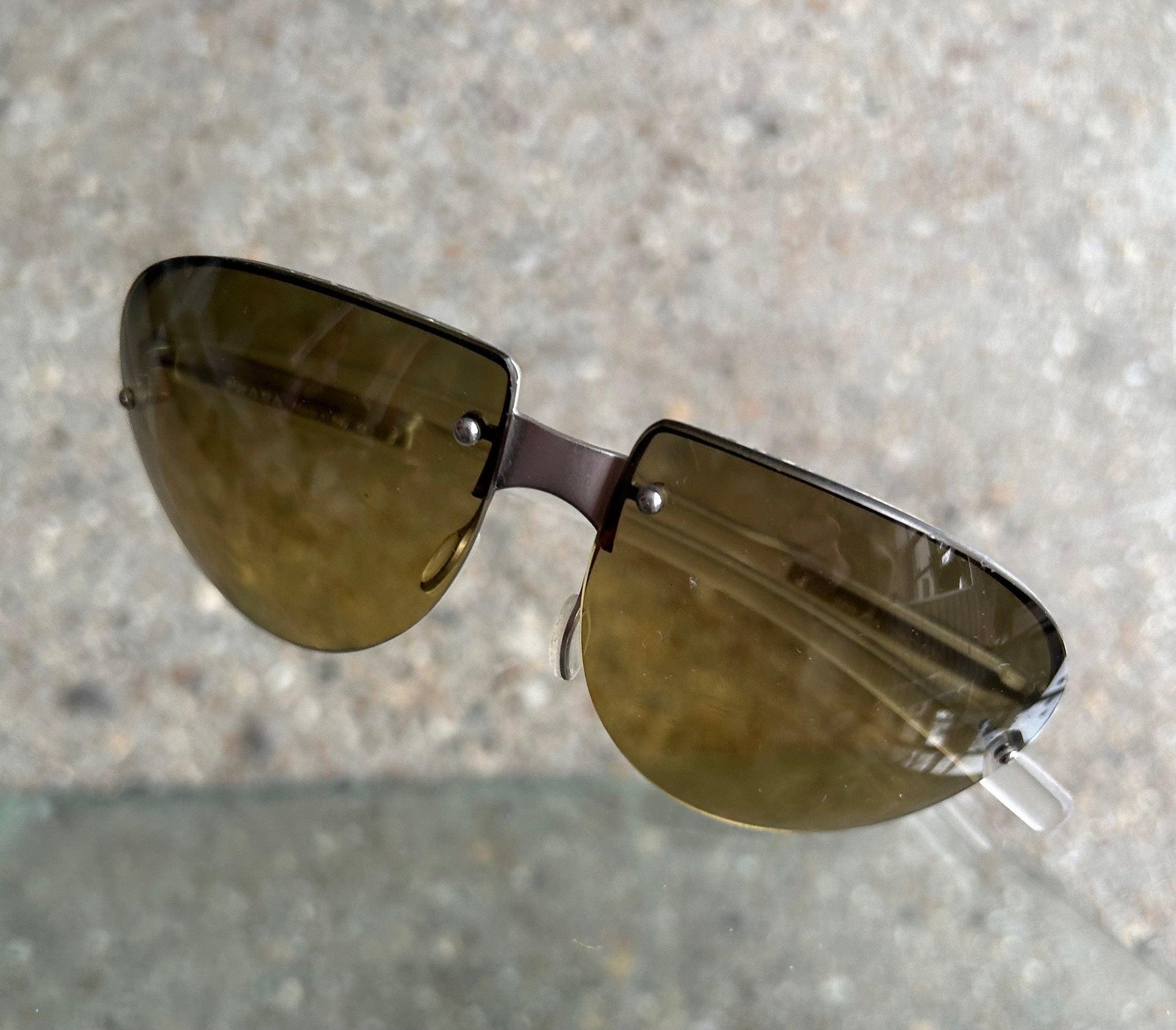 Prada Sunglasses - Known Source