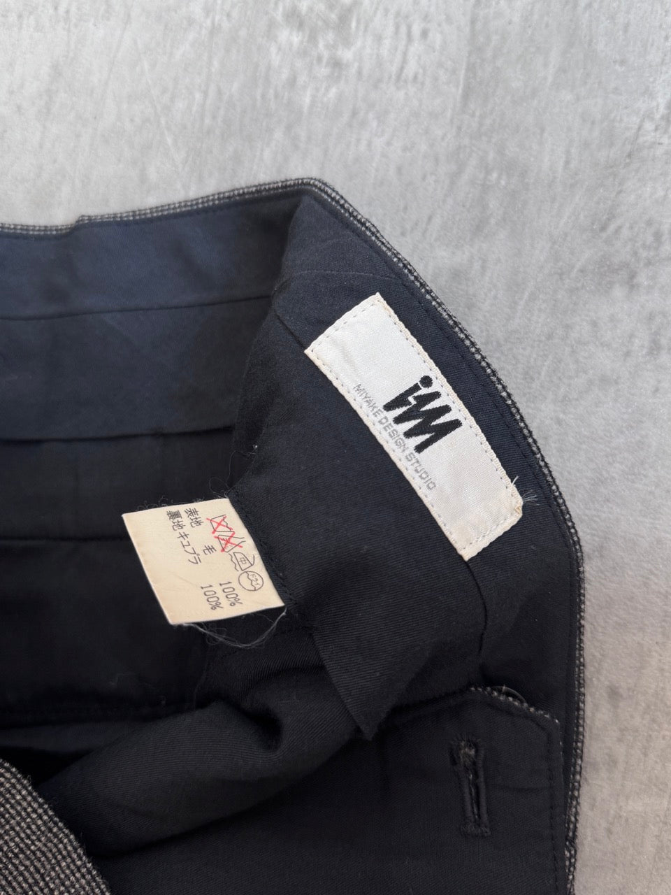 Issey Miyake Pleated Wool Herringbone Trousers