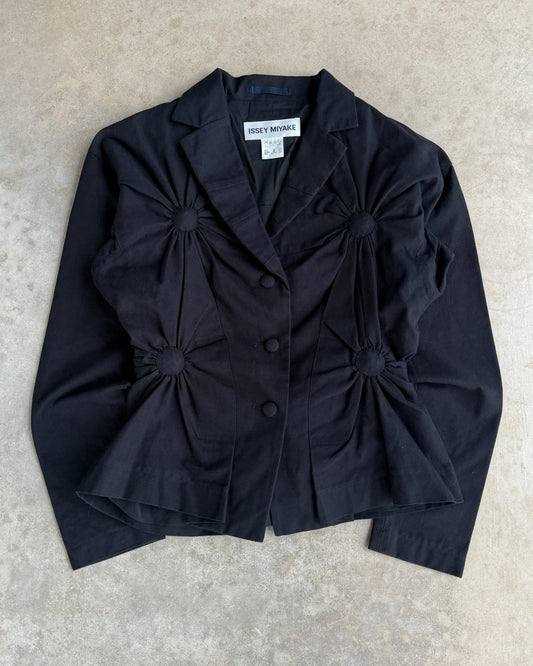 Issey Miyake FW03 Ruched Circle Jacket – S-on a concrete background