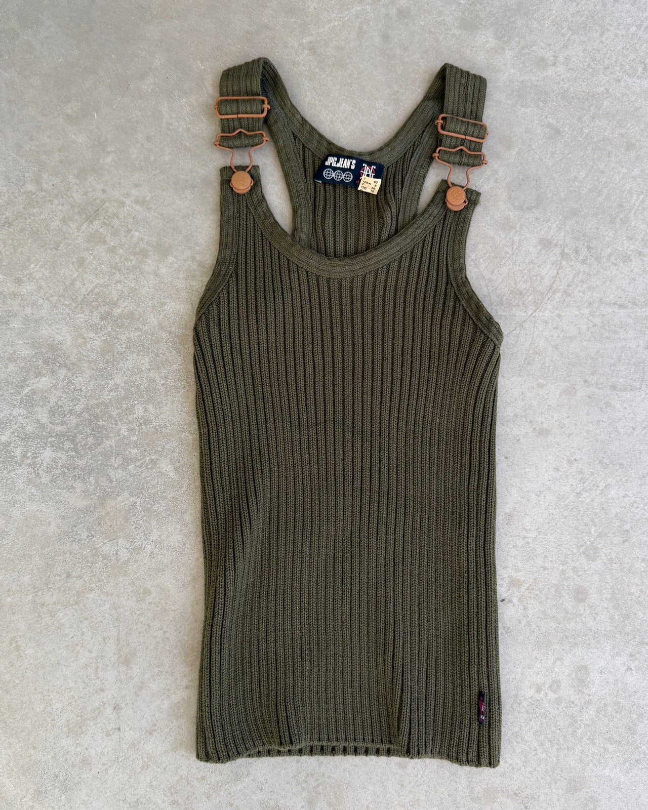 JPG Jeans Ripped Dark Green Tank Top – S-on a concrete background