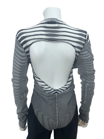 A long-sleeve top with black and white horizontal stripes, displayed on a white mannequin torso against a plain light background.