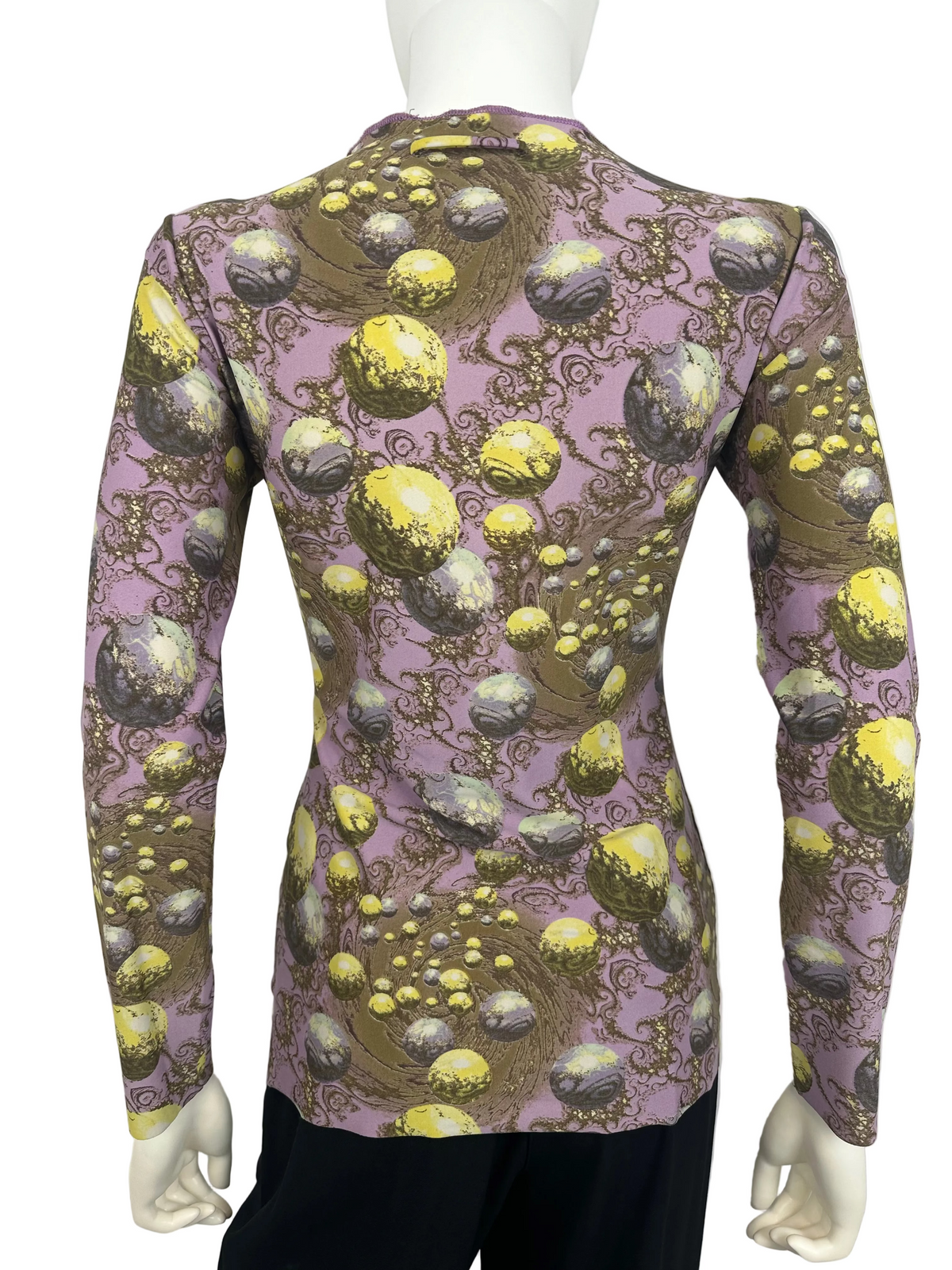 Pink and yellow print top on a mannequin