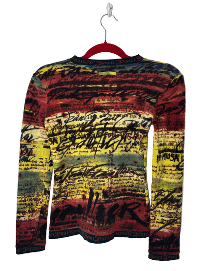 https://cdn.shopify.com/s/files/1/0900/2729/5066/files/Jean_Paul_Gaultier_Knit_Script_Top_Hanger_Back.heic?v=1768420431