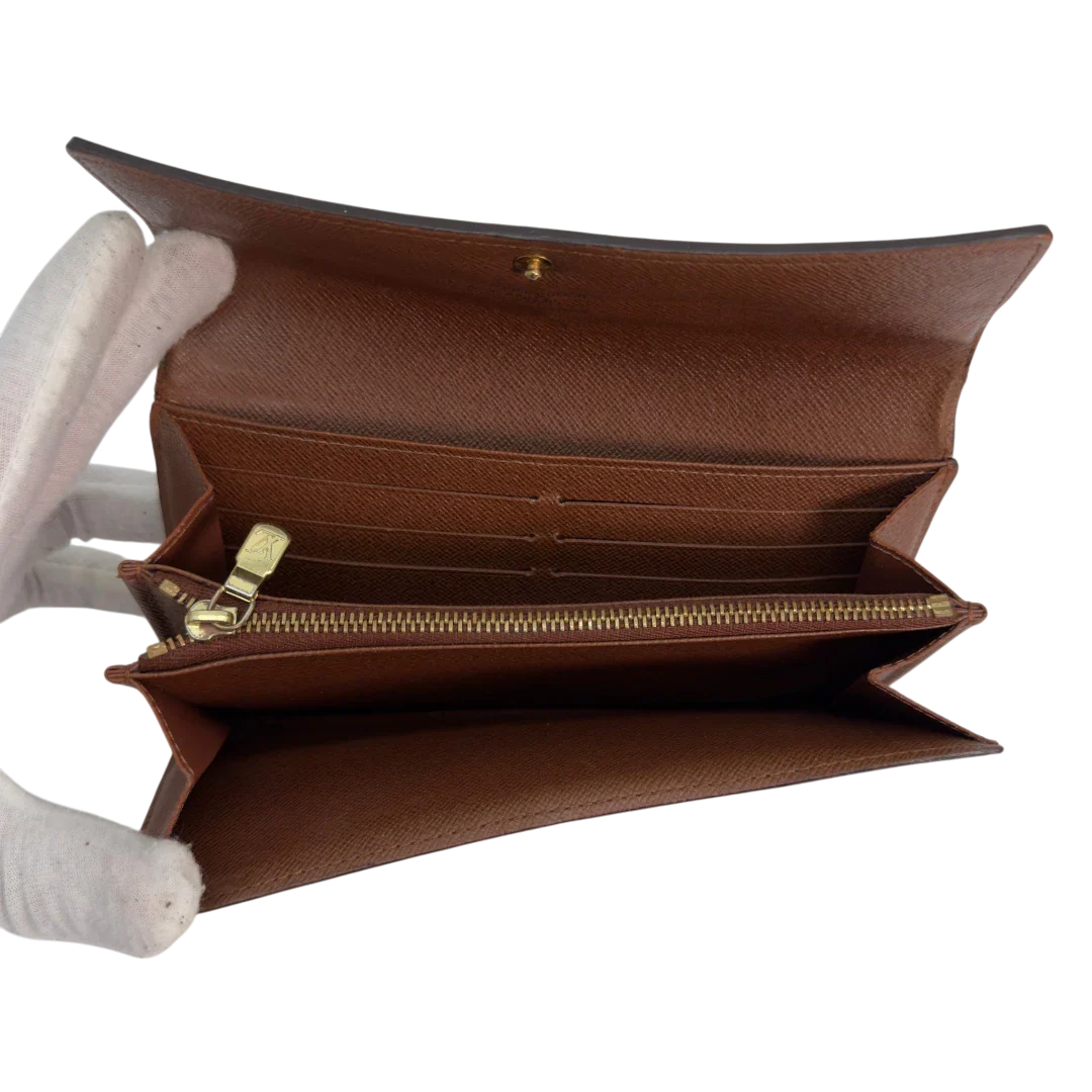 https://cdn.shopify.com/s/files/1/0564/9376/8855/files/LouisVuittonGeldbeutelPortefeuilleSarahmonogrambraun8628.webp?v=1781083839