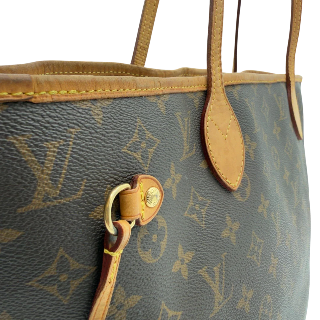 https://cdn.shopify.com/s/files/1/0564/9376/8855/files/LouisVuittonShopperNeverfullMMmonogrambraun8482.webp?v=1780486464