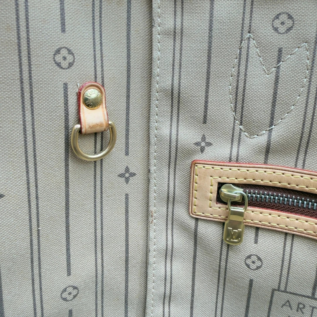 https://cdn.shopify.com/s/files/1/0564/9376/8855/files/LouisVuittonShopperNeverfullMMmonogrambraun8485.webp?v=1780486467