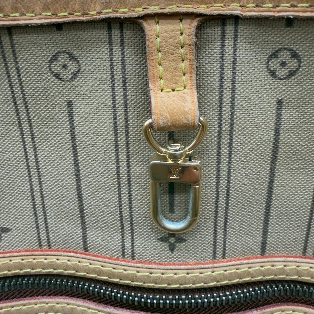 https://cdn.shopify.com/s/files/1/0564/9376/8855/files/LouisVuittonShopperNeverfullMMmonogrambraun8486.webp?v=1780486465