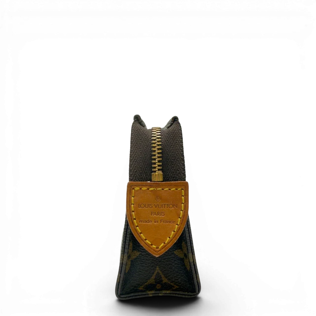 https://cdn.shopify.com/s/files/1/0564/9376/8855/files/Louis_Vuitton_Clutch_Pouch_Toilette_monogram_braun_2.webp?v=1783511121