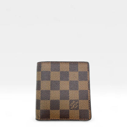 https://cdn.shopify.com/s/files/1/0564/9376/8855/files/Louis_Vuitton_Geldbeutel_Damier_Ebene_braun_vintage_LV_wallet1284.webp?v=1762427142