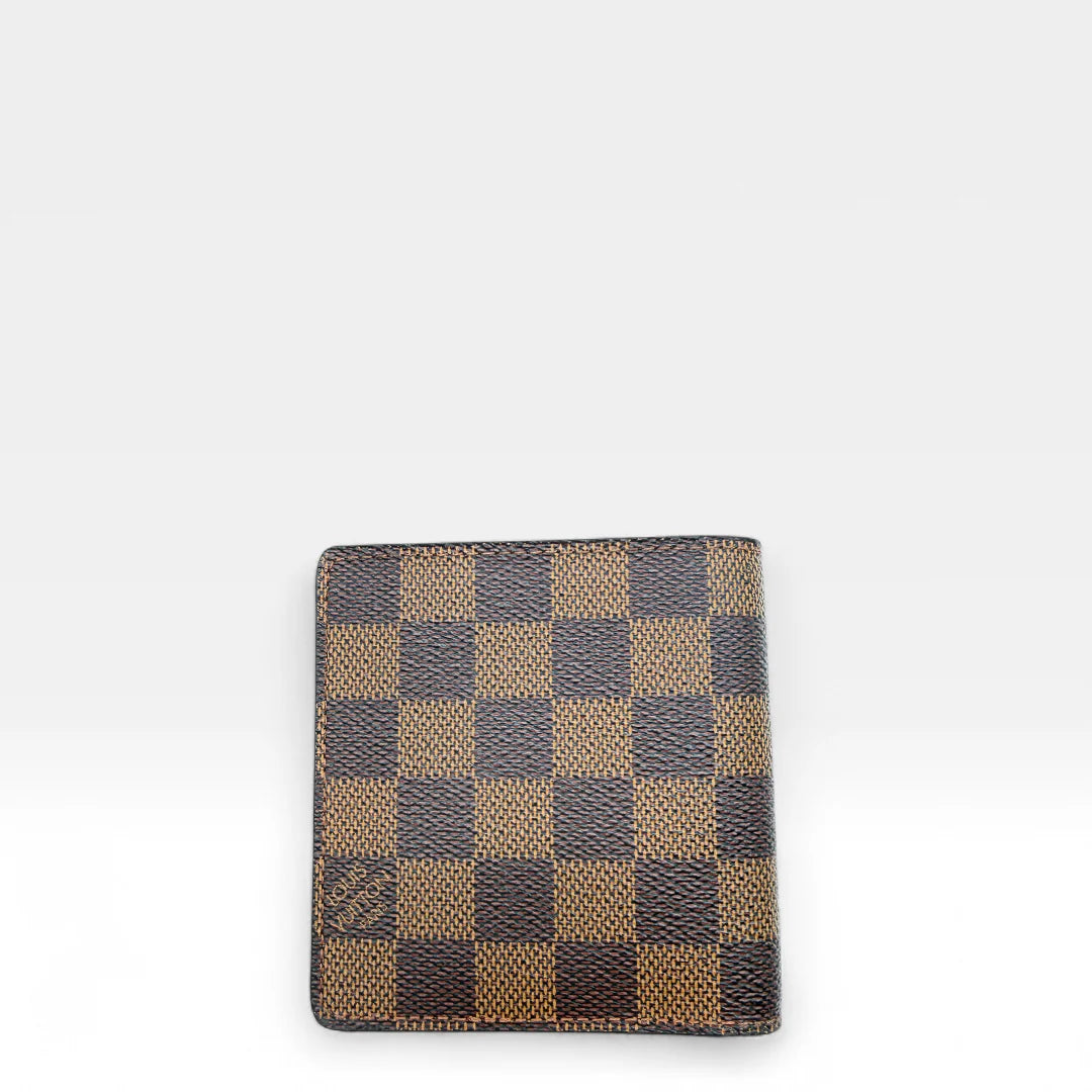 https://cdn.shopify.com/s/files/1/0564/9376/8855/files/Louis_Vuitton_Geldbeutel_Damier_Ebene_braun_vintage_LV_wallet1287.webp?v=1762427142