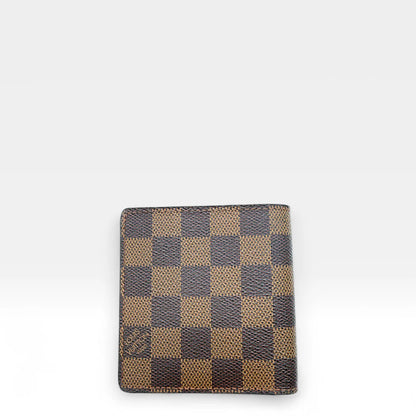 https://cdn.shopify.com/s/files/1/0564/9376/8855/files/Louis_Vuitton_Geldbeutel_Damier_Ebene_braun_vintage_LV_wallet1287.webp?v=1762427142