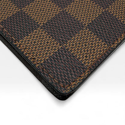 https://cdn.shopify.com/s/files/1/0564/9376/8855/files/Louis_Vuitton_Geldbeutel_Damier_Ebene_braun_vintage_LV_wallet1293.webp?v=1762427143