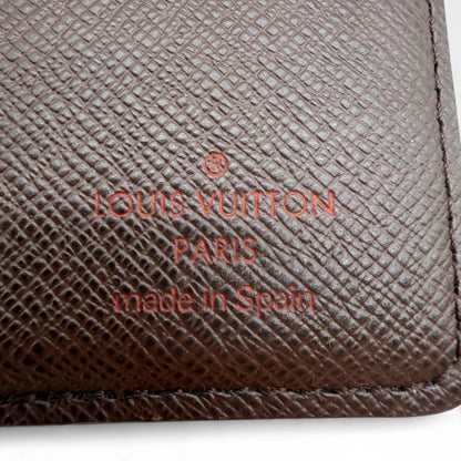 https://cdn.shopify.com/s/files/1/0564/9376/8855/files/Louis_Vuitton_Geldbeutel_Damier_Ebene_braun_vintage_LV_wallet1296.webp?v=1762427143