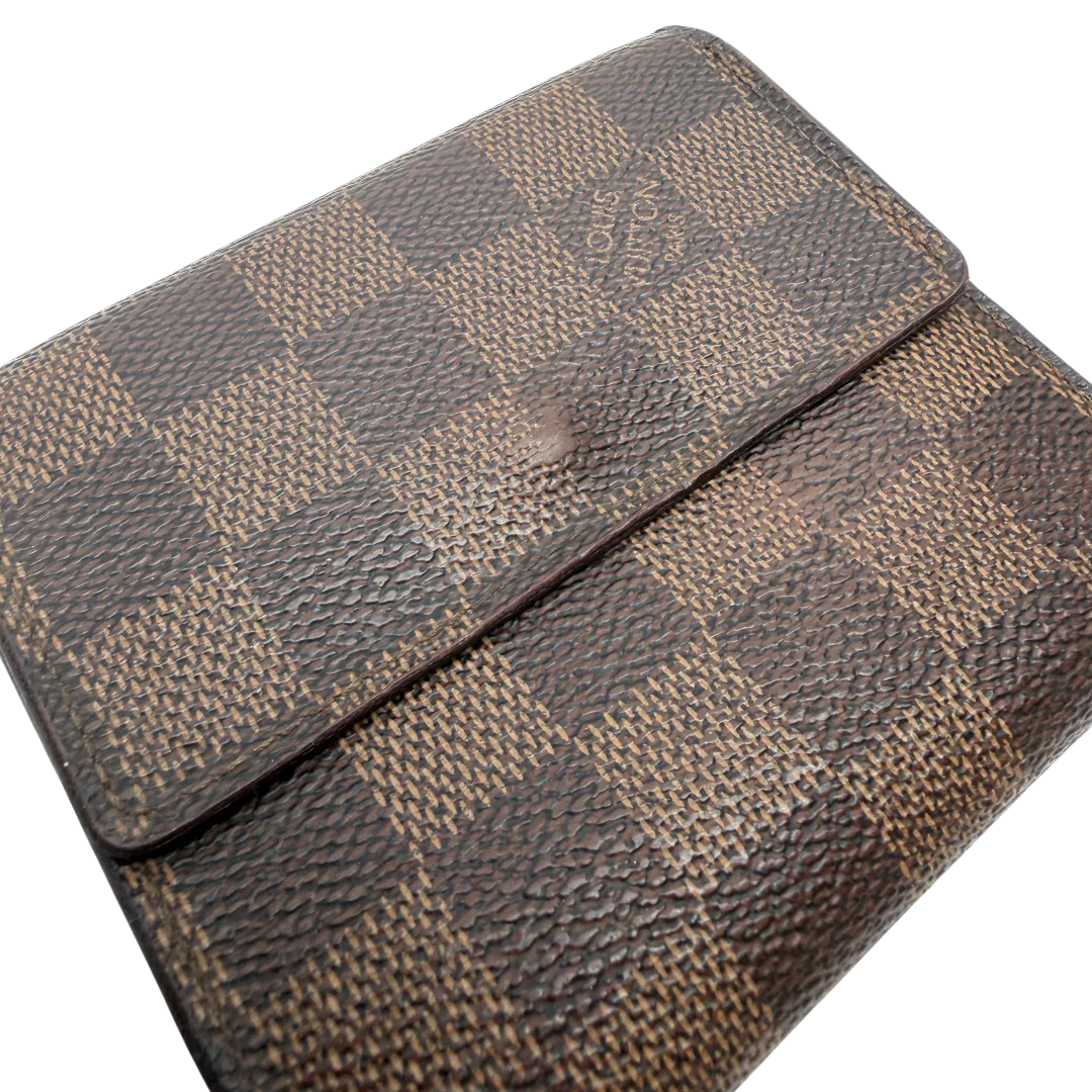 https://cdn.shopify.com/s/files/1/0564/9376/8855/files/Louis_Vuitton_Geldbeutel_Elise_Damier_Ebene_braun_vintage_LV_0201.webp?v=1771411631