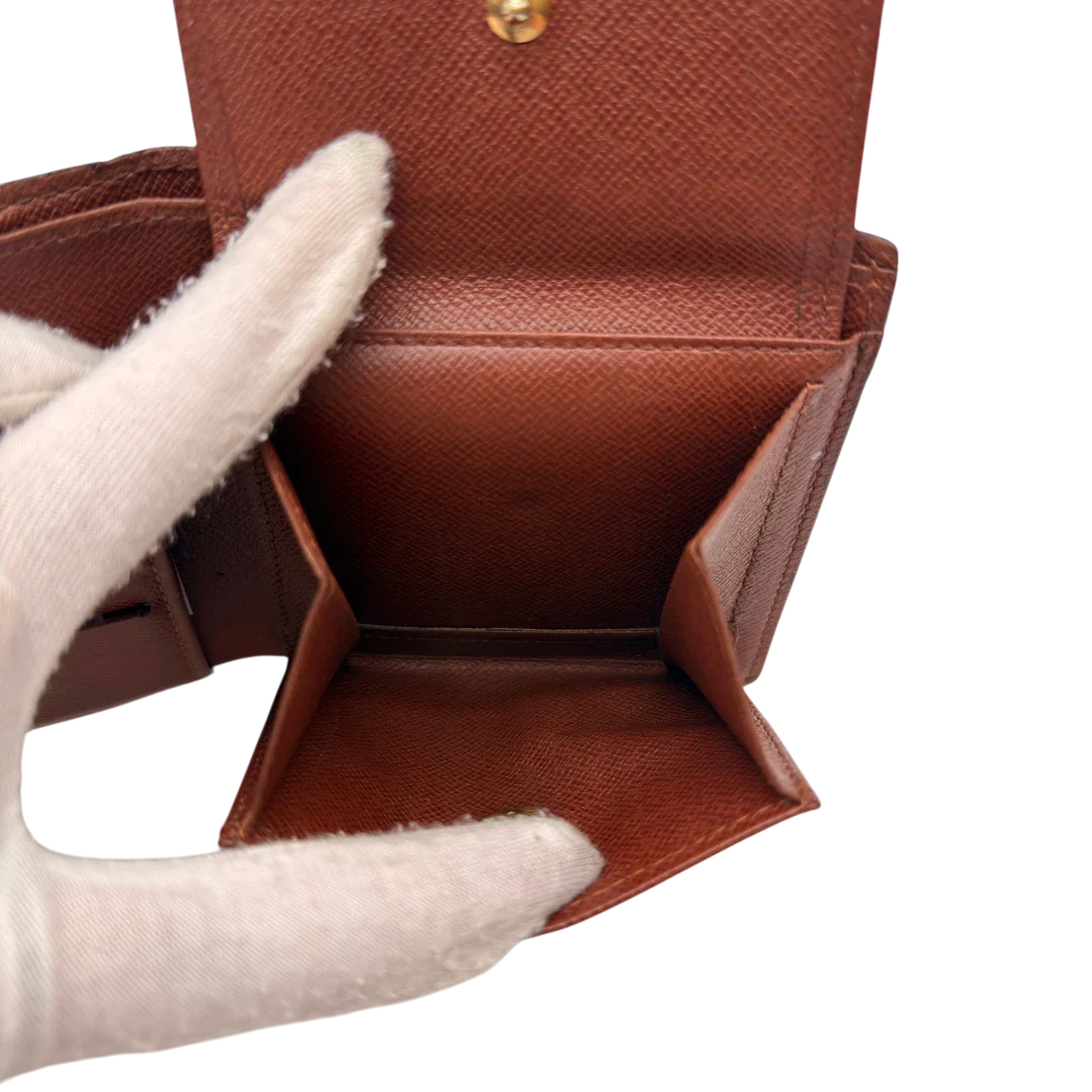 https://cdn.shopify.com/s/files/1/0564/9376/8855/files/Louis_Vuitton_Geldbeutel_Marco_monogram_braun_16.webp?v=1784243394