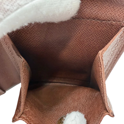 https://cdn.shopify.com/s/files/1/0564/9376/8855/files/Louis_Vuitton_Geldbeutel_Marco_monogram_braun_vintage_LV3885.webp?v=1775054448