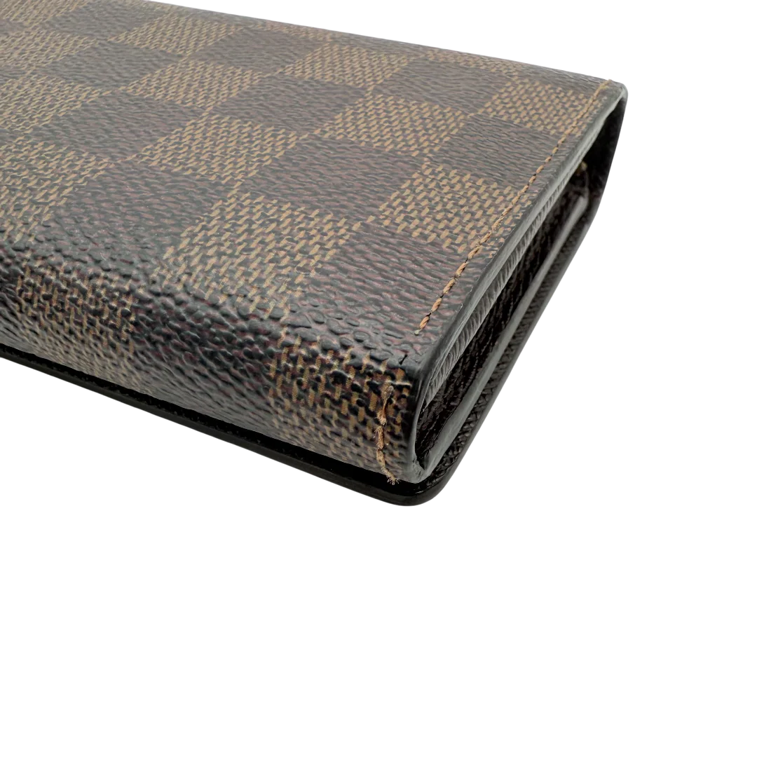 https://cdn.shopify.com/s/files/1/0564/9376/8855/files/Louis_Vuitton_Geldbeutel_Porte_Monnaie_Tresor_Damier_Ebene_braun_vintage_LV_1364.webp?v=1771414021