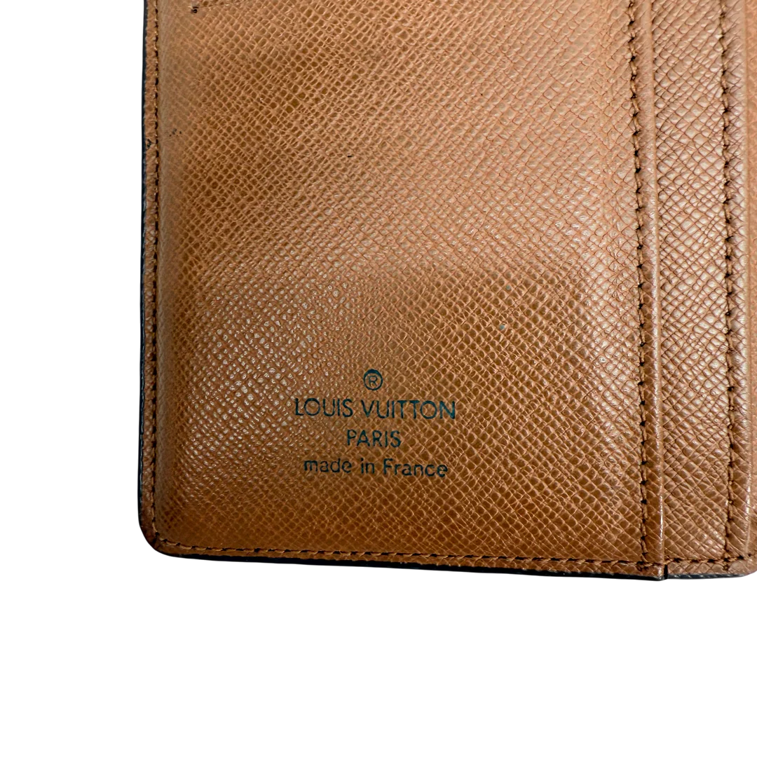 https://cdn.shopify.com/s/files/1/0564/9376/8855/files/Louis_Vuitton_Geldbeutel_Porte_Monnaie_Viennois_monogram_braun_vintage_LV_0898.webp?v=1770947056