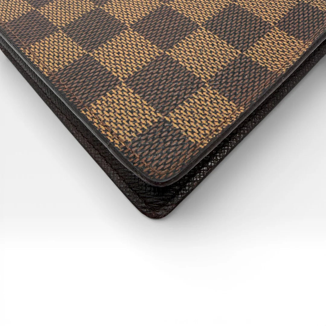 https://cdn.shopify.com/s/files/1/0564/9376/8855/files/Louis_Vuitton_Geldbeutel_Portefeuille_Damier_Ebene_braun_vintage_LV_8676.webp?v=1769075832