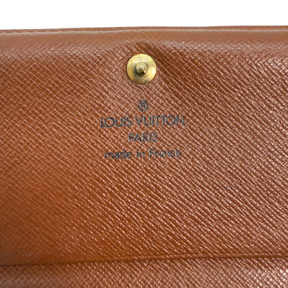 https://cdn.shopify.com/s/files/1/0564/9376/8855/files/Louis_Vuitton_Geldbeutel_Portefeuille_International_monogram_braun_vintage_LV8640.webp?v=1781084066
