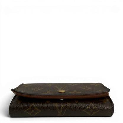 https://cdn.shopify.com/s/files/1/0564/9376/8855/files/Louis_Vuitton_Geldbeutel_Portefeuille_International_monogram_braun_vintage_LV8647.webp?v=1781084065