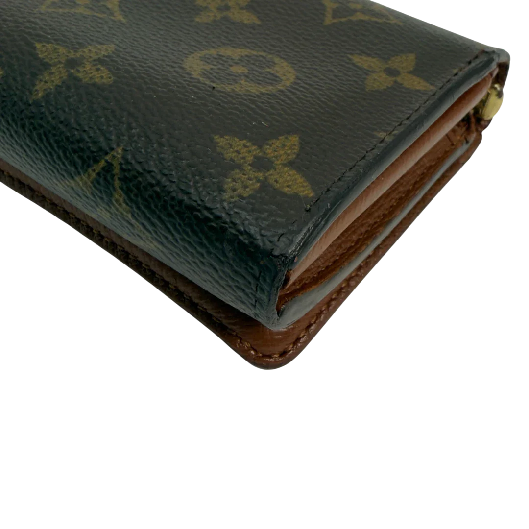 https://cdn.shopify.com/s/files/1/0564/9376/8855/files/Louis_Vuitton_Geldbeutel_Portefeuille_International_monogram_braun_vintage_LV8650.webp?v=1781084065