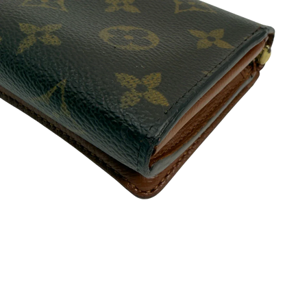 https://cdn.shopify.com/s/files/1/0564/9376/8855/files/Louis_Vuitton_Geldbeutel_Portefeuille_International_monogram_braun_vintage_LV8650.webp?v=1781084065