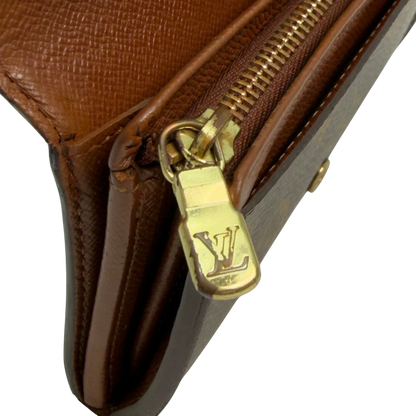 https://cdn.shopify.com/s/files/1/0564/9376/8855/files/Louis_Vuitton_Geldbeutel_Portefeuille_International_monogram_braun_vintage_LV8652.webp?v=1781084066