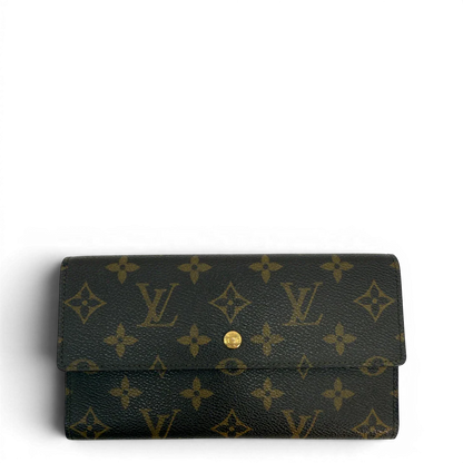 https://cdn.shopify.com/s/files/1/0564/9376/8855/files/Louis_Vuitton_Geldbeutel_Portefeuille_International_monogram_braun_vintage_LV8668.webp?v=1781083497