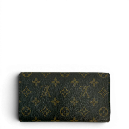 https://cdn.shopify.com/s/files/1/0564/9376/8855/files/Louis_Vuitton_Geldbeutel_Portefeuille_International_monogram_braun_vintage_LV8669.webp?v=1781083497