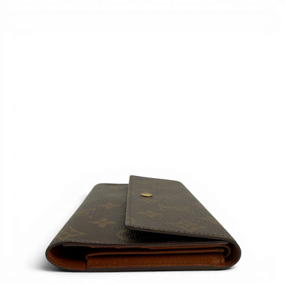 https://cdn.shopify.com/s/files/1/0564/9376/8855/files/Louis_Vuitton_Geldbeutel_Portefeuille_International_monogram_braun_vintage_LV8670.webp?v=1781083496
