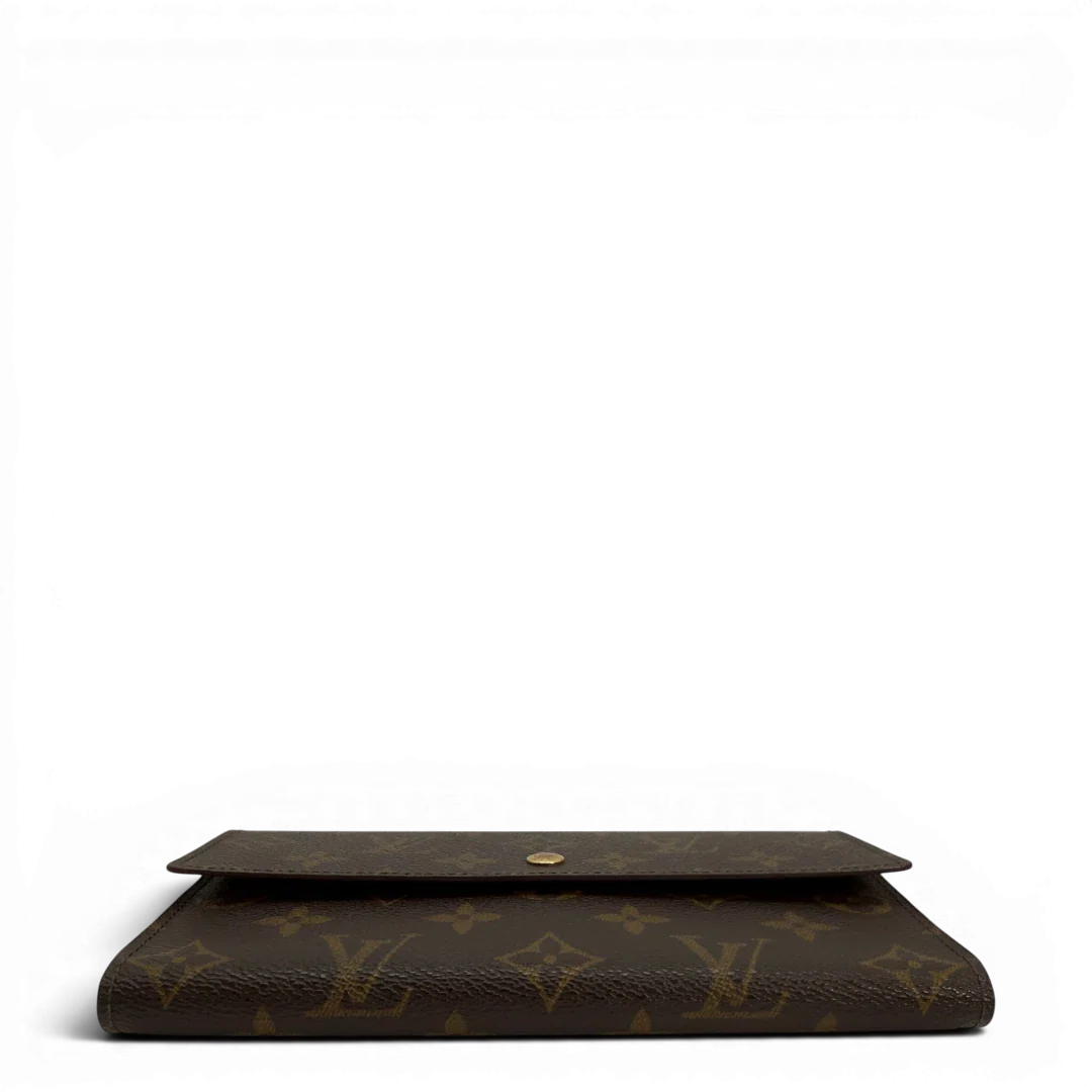 https://cdn.shopify.com/s/files/1/0564/9376/8855/files/Louis_Vuitton_Geldbeutel_Portefeuille_International_monogram_braun_vintage_LV8672.webp?v=1781083496