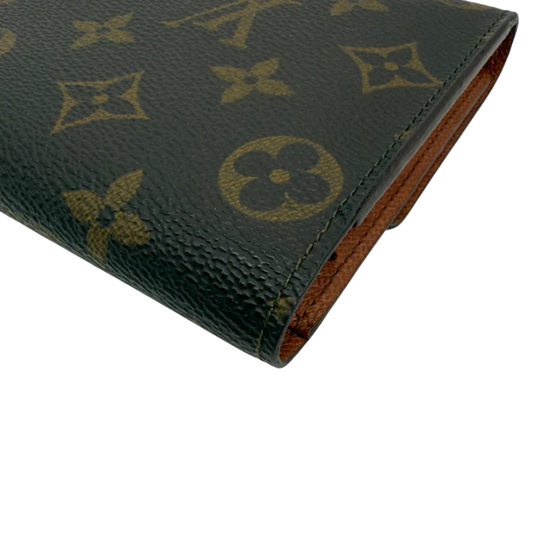 https://cdn.shopify.com/s/files/1/0564/9376/8855/files/Louis_Vuitton_Geldbeutel_Portefeuille_International_monogram_braun_vintage_LV8675.webp?v=1781083497