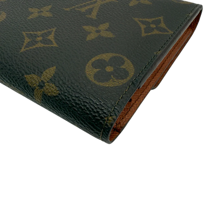 https://cdn.shopify.com/s/files/1/0564/9376/8855/files/Louis_Vuitton_Geldbeutel_Portefeuille_International_monogram_braun_vintage_LV8675.webp?v=1781083497