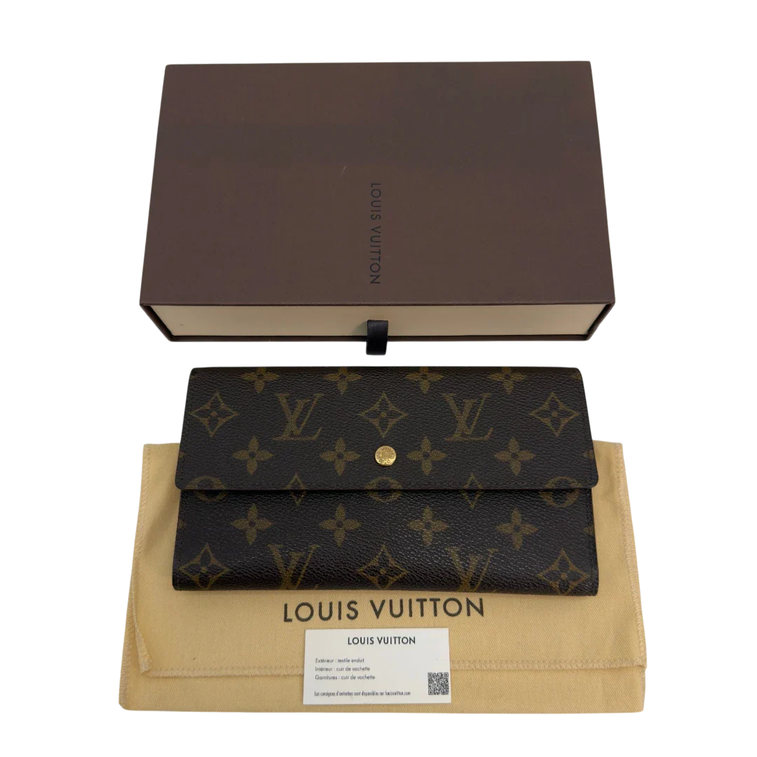 https://cdn.shopify.com/s/files/1/0564/9376/8855/files/Louis_Vuitton_Geldbeutel_Portefeuille_International_monogram_braun_vintage_LV8681.webp?v=1781083497