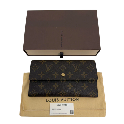 https://cdn.shopify.com/s/files/1/0564/9376/8855/files/Louis_Vuitton_Geldbeutel_Portefeuille_International_monogram_braun_vintage_LV8681.webp?v=1781083497