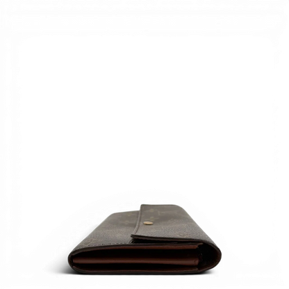 https://cdn.shopify.com/s/files/1/0564/9376/8855/files/Louis_Vuitton_Geldbeutel_Portefeuille_Sarah_monogram_braun_vintage_LV8234.webp?v=1781083757