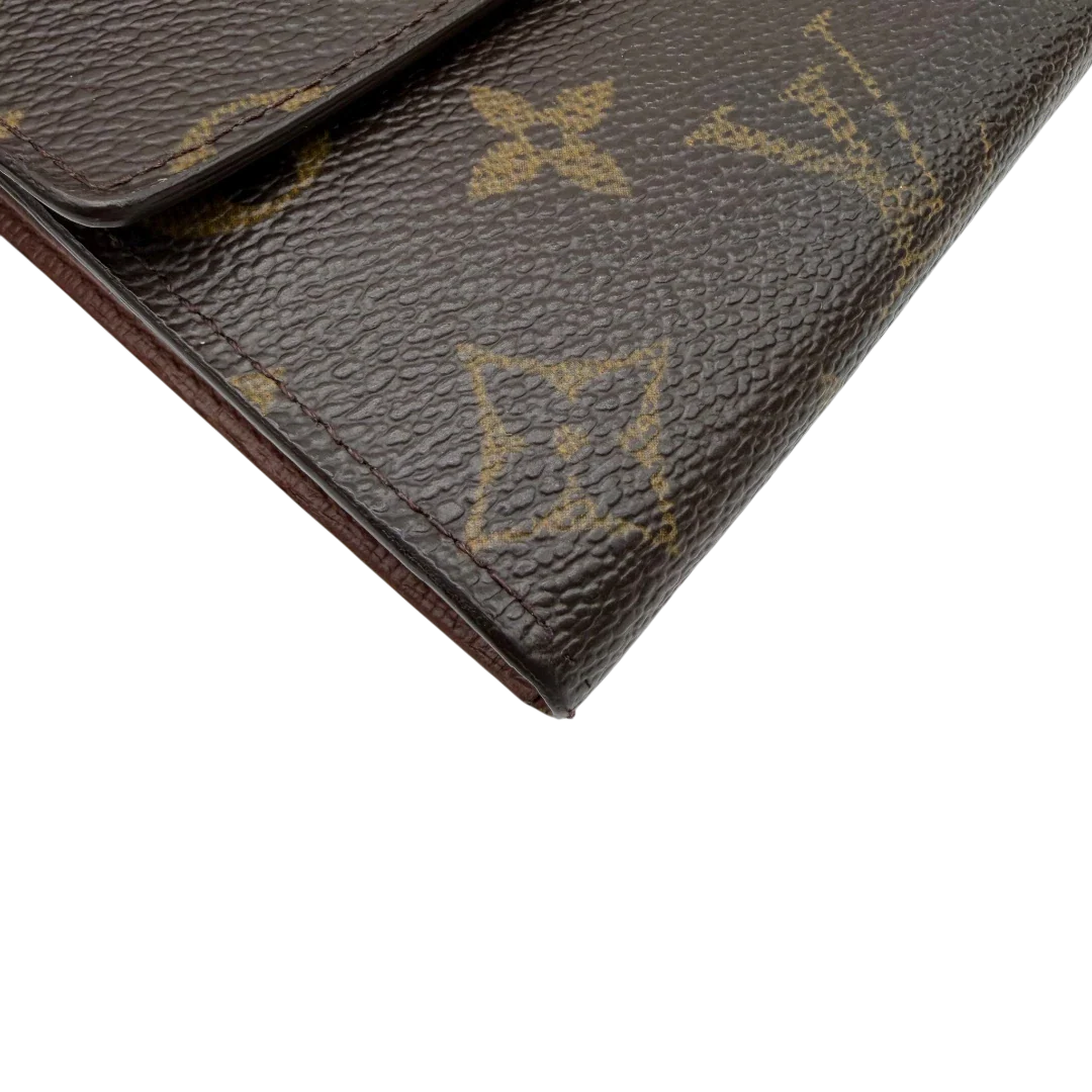 https://cdn.shopify.com/s/files/1/0564/9376/8855/files/Louis_Vuitton_Geldbeutel_Portefeuille_Sarah_monogram_braun_vintage_LV8235.webp?v=1781083757