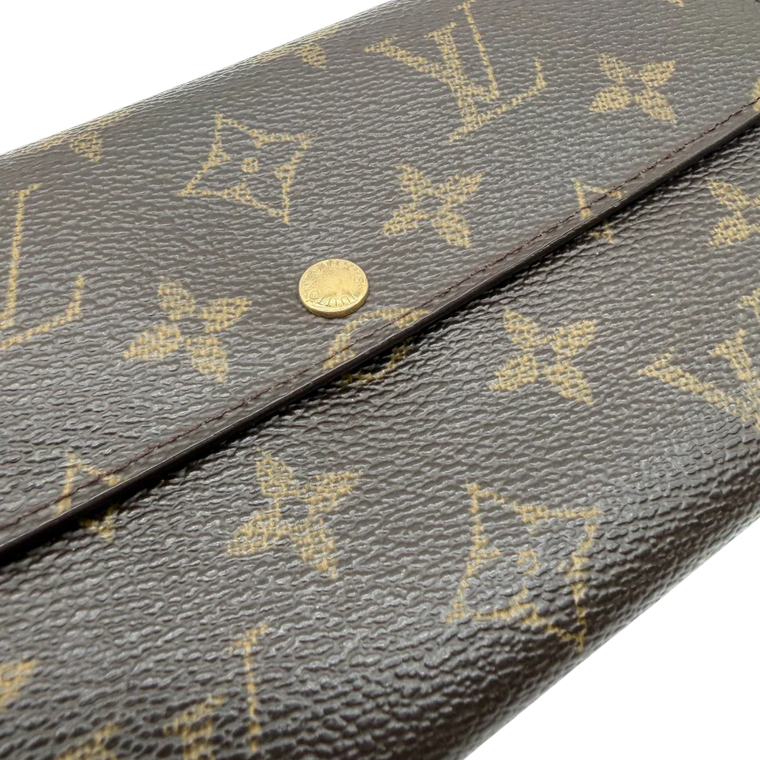 https://cdn.shopify.com/s/files/1/0564/9376/8855/files/Louis_Vuitton_Geldbeutel_Portefeuille_Sarah_monogram_braun_vintage_LV8241.webp?v=1781083758