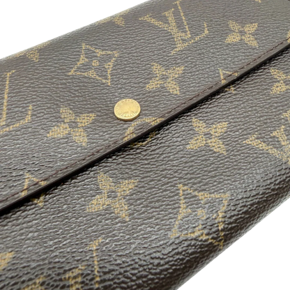 https://cdn.shopify.com/s/files/1/0564/9376/8855/files/Louis_Vuitton_Geldbeutel_Portefeuille_Sarah_monogram_braun_vintage_LV8241.webp?v=1781083758