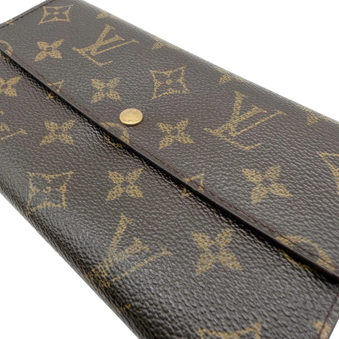 https://cdn.shopify.com/s/files/1/0564/9376/8855/files/Louis_Vuitton_Geldbeutel_Portefeuille_Sarah_monogram_braun_vintage_LV8242.webp?v=1781083758