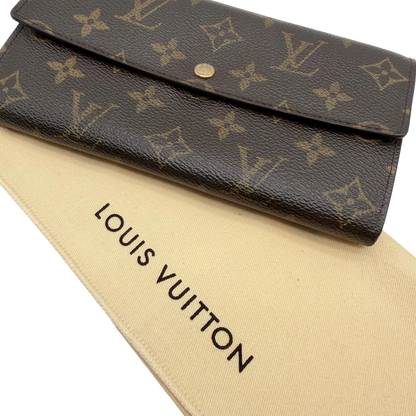 https://cdn.shopify.com/s/files/1/0564/9376/8855/files/Louis_Vuitton_Geldbeutel_Portefeuille_Sarah_monogram_braun_vintage_LV8256.webp?v=1781083758