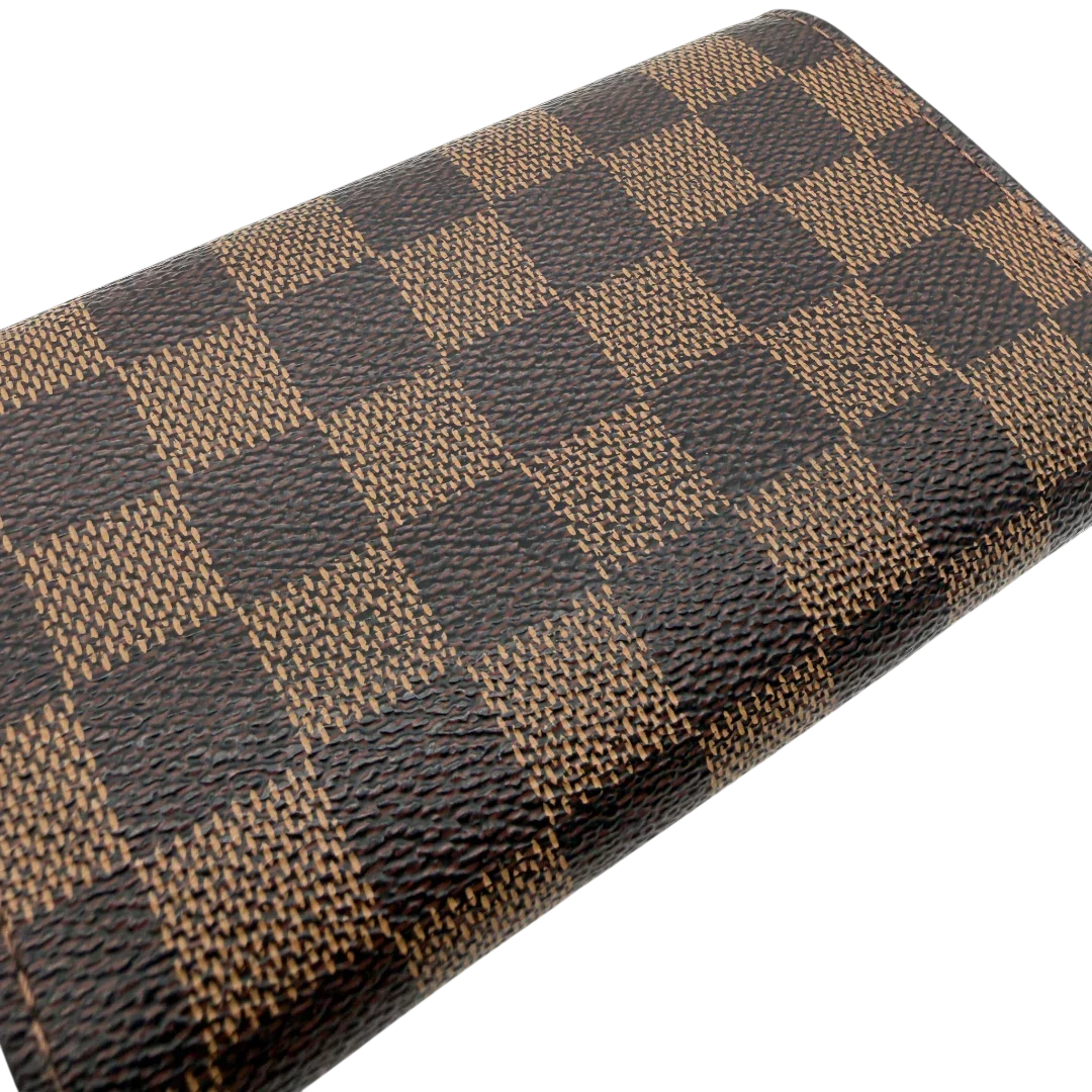 https://cdn.shopify.com/s/files/1/0564/9376/8855/files/Louis_Vuitton_Geldbeutel_Portefeuille_Tresor_Damier_Ebene_braun_vintage_LV8202.webp?v=1781083660