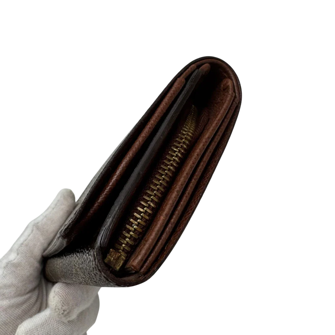 https://cdn.shopify.com/s/files/1/0564/9376/8855/files/Louis_Vuitton_Geldbeutel_Portefeuille_Tresor_monogram_braun_3_2a1ec154-4e5b-411b-b888-43cb0e90bb2c.webp?v=1784270561